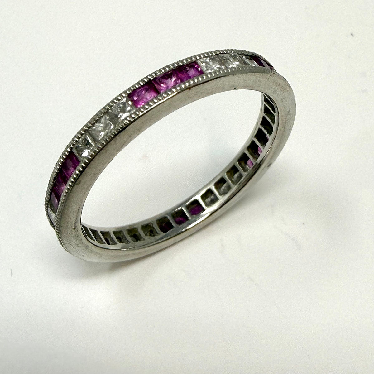 Platinum Ring with with Channel Set Pink Sapphire and Diamond
