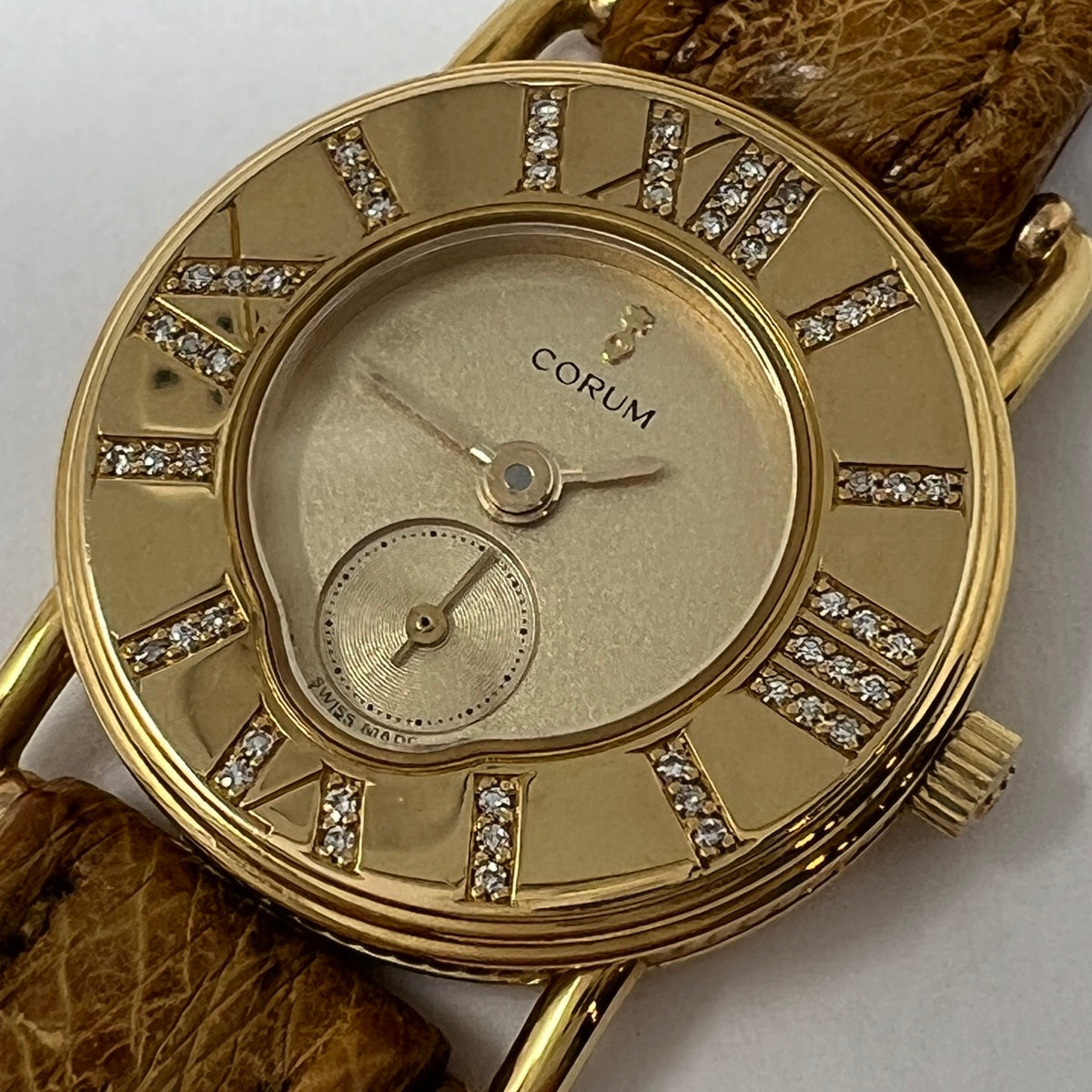 Corum 18K Gold Watch with Roman Numerals and Tan Ostrich Strap