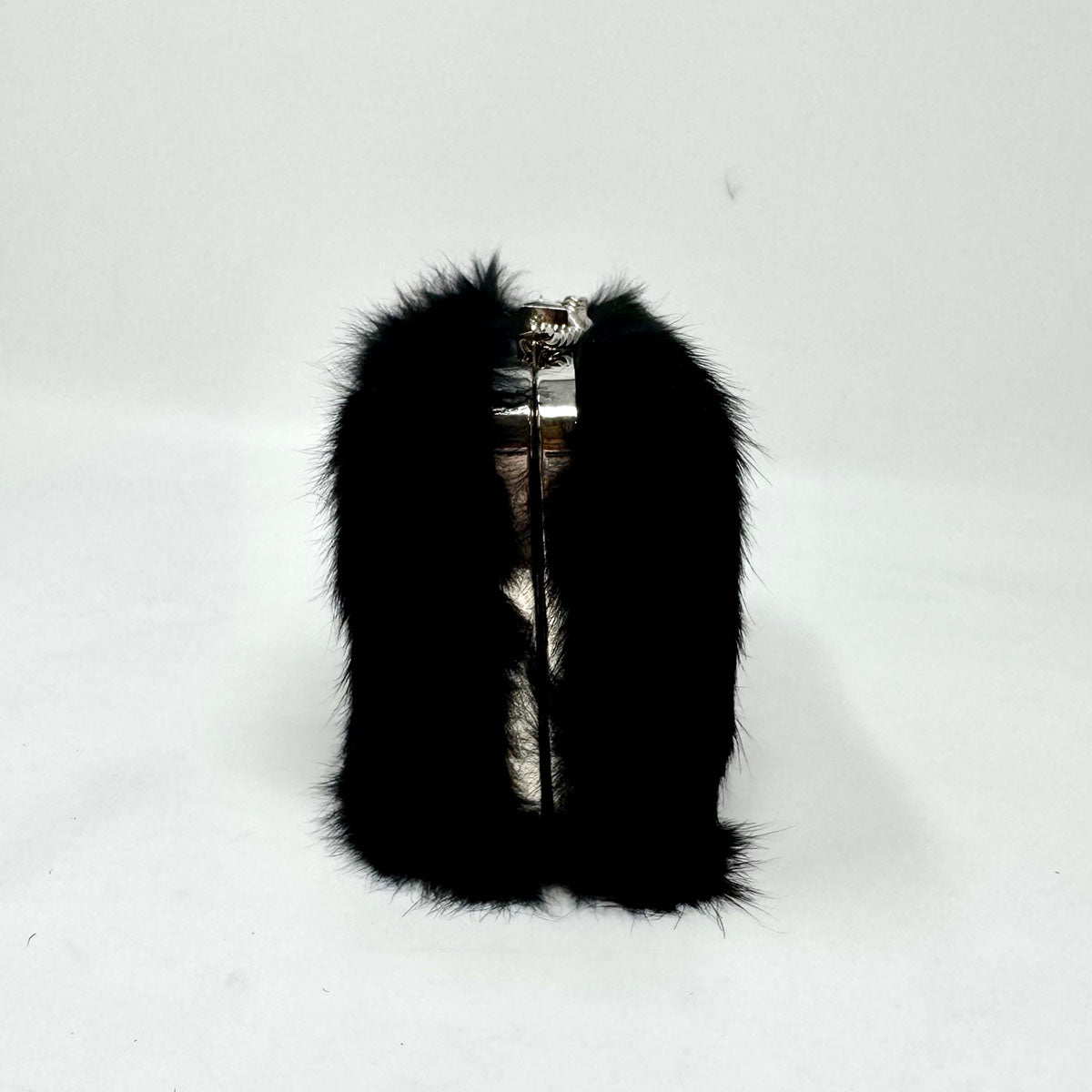 Angela Alvarez Clutch
