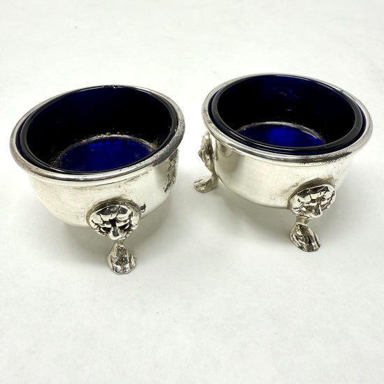 Pair of Glass Lined Repousse Sterling Salt Cellers