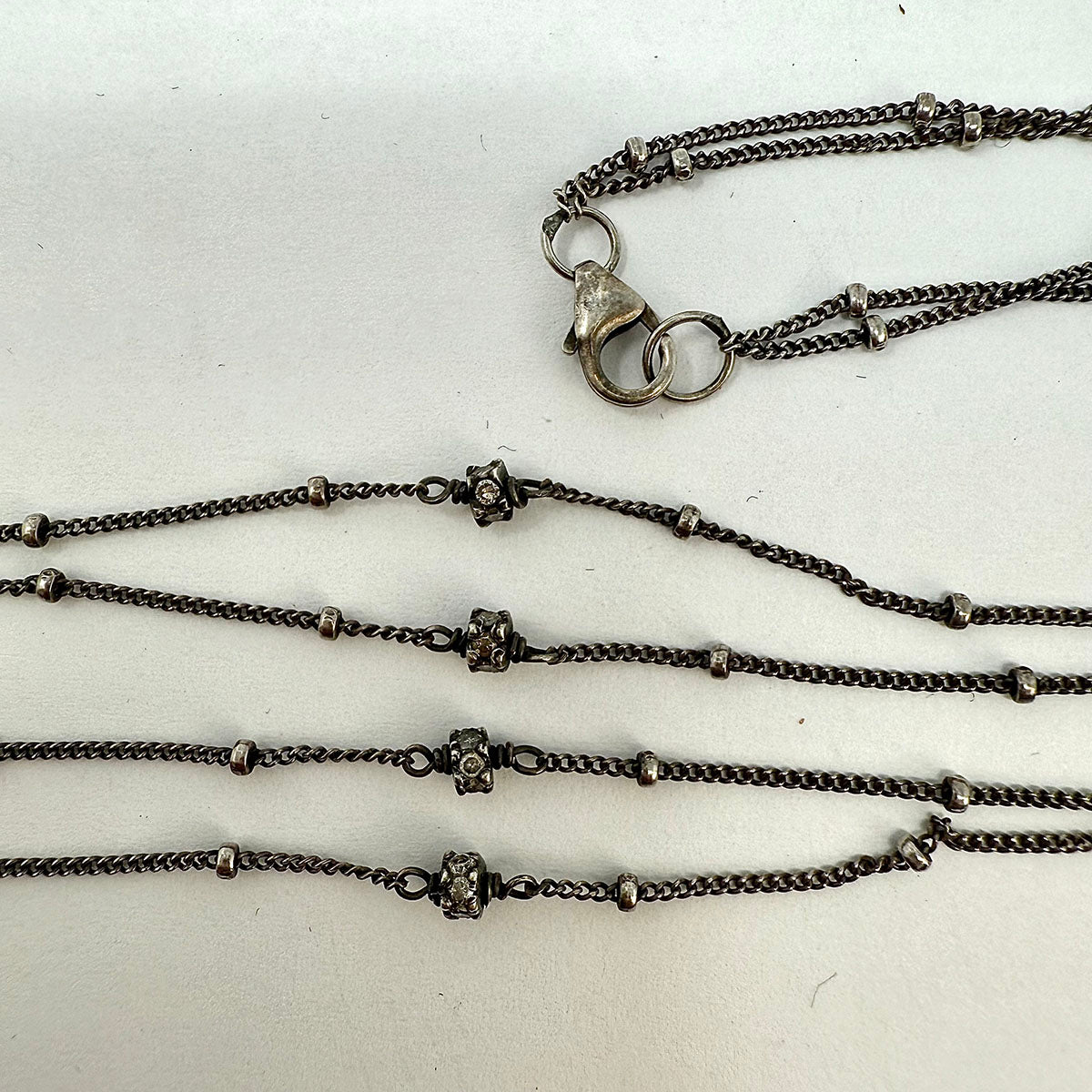 Sterling Silver Chain with Feather Pendant with Pave Diamonds