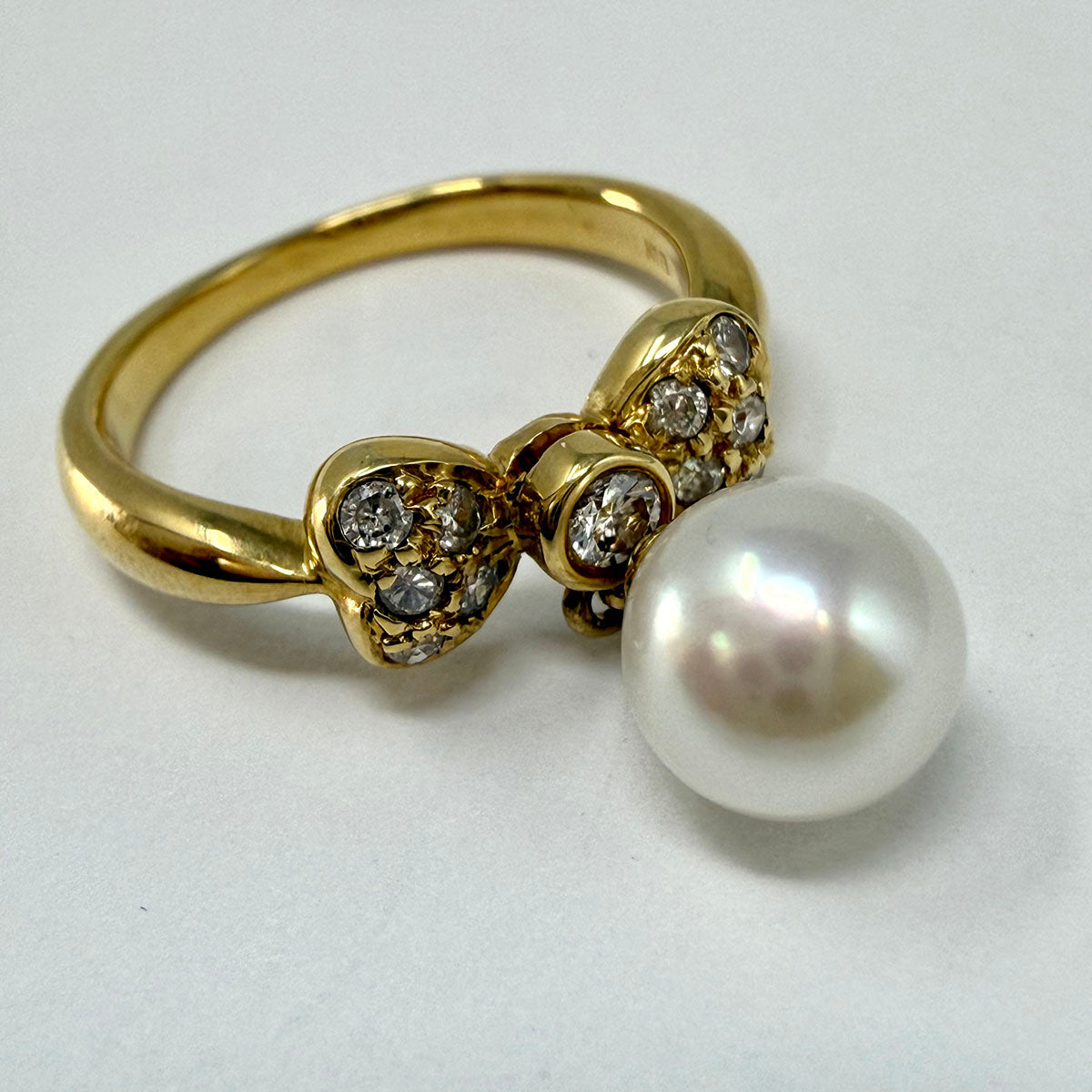 Bow Ring with Diamonds and Pearl