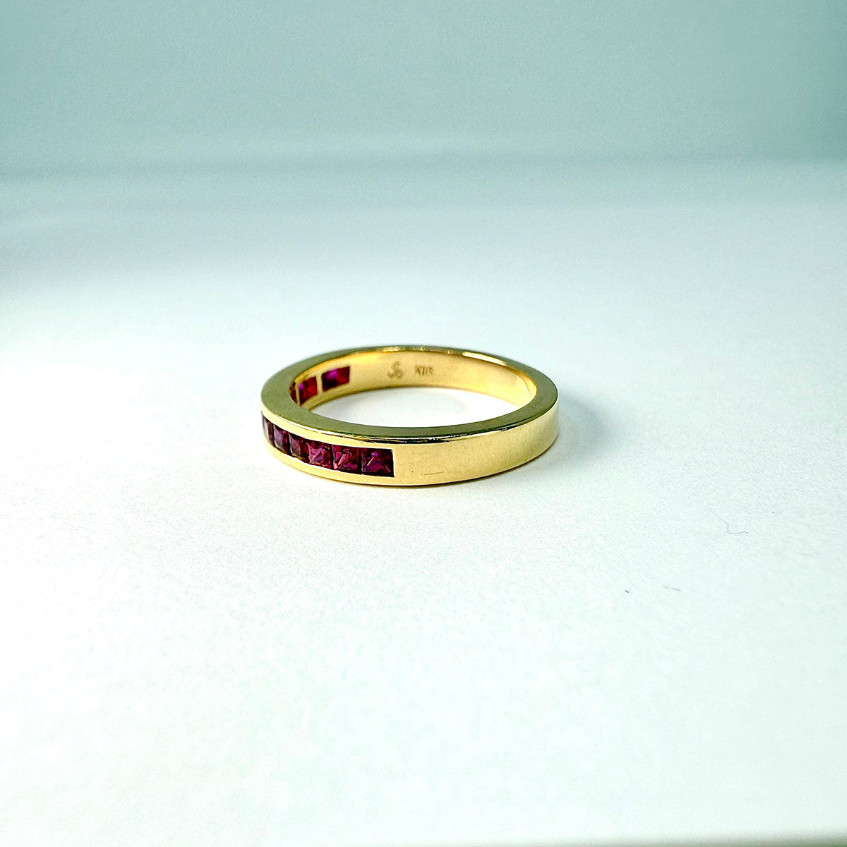 18K Gold Ring with 13 Channel Set Rubies