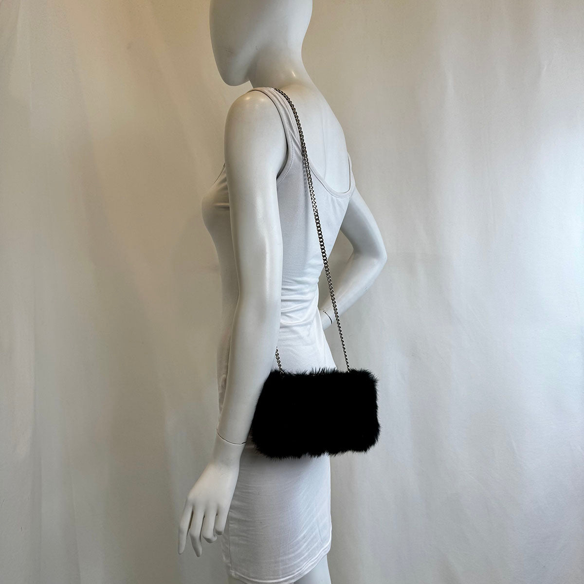 Angela Alvarez Clutch