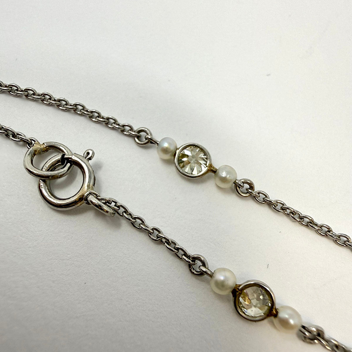 Platinum Necklace with 9 Round Bezel Set Diamonds and 18 Small Cultured Pearls