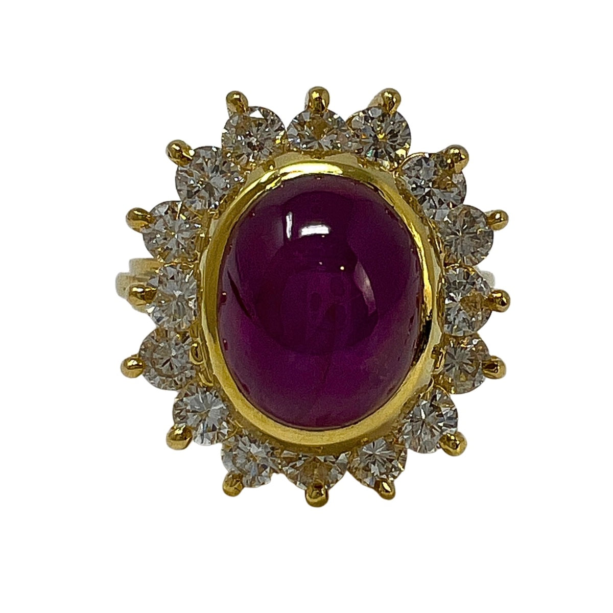 18K Gold Ring with Star Ruby and 16 Diamonds