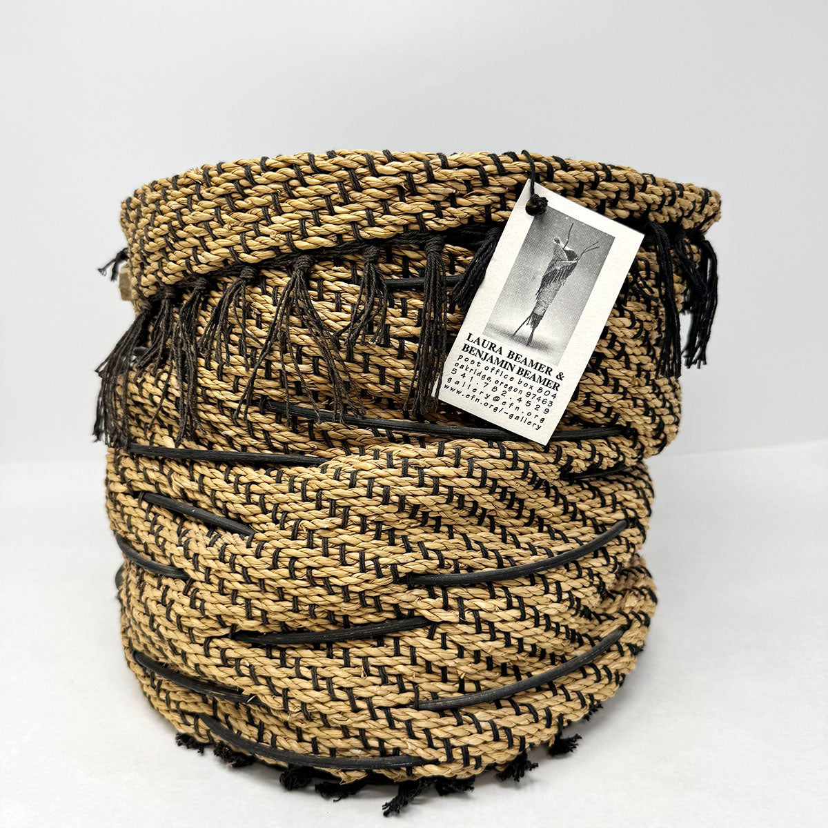 Loomwoven Seagrass Basket adorned with Sandstone
