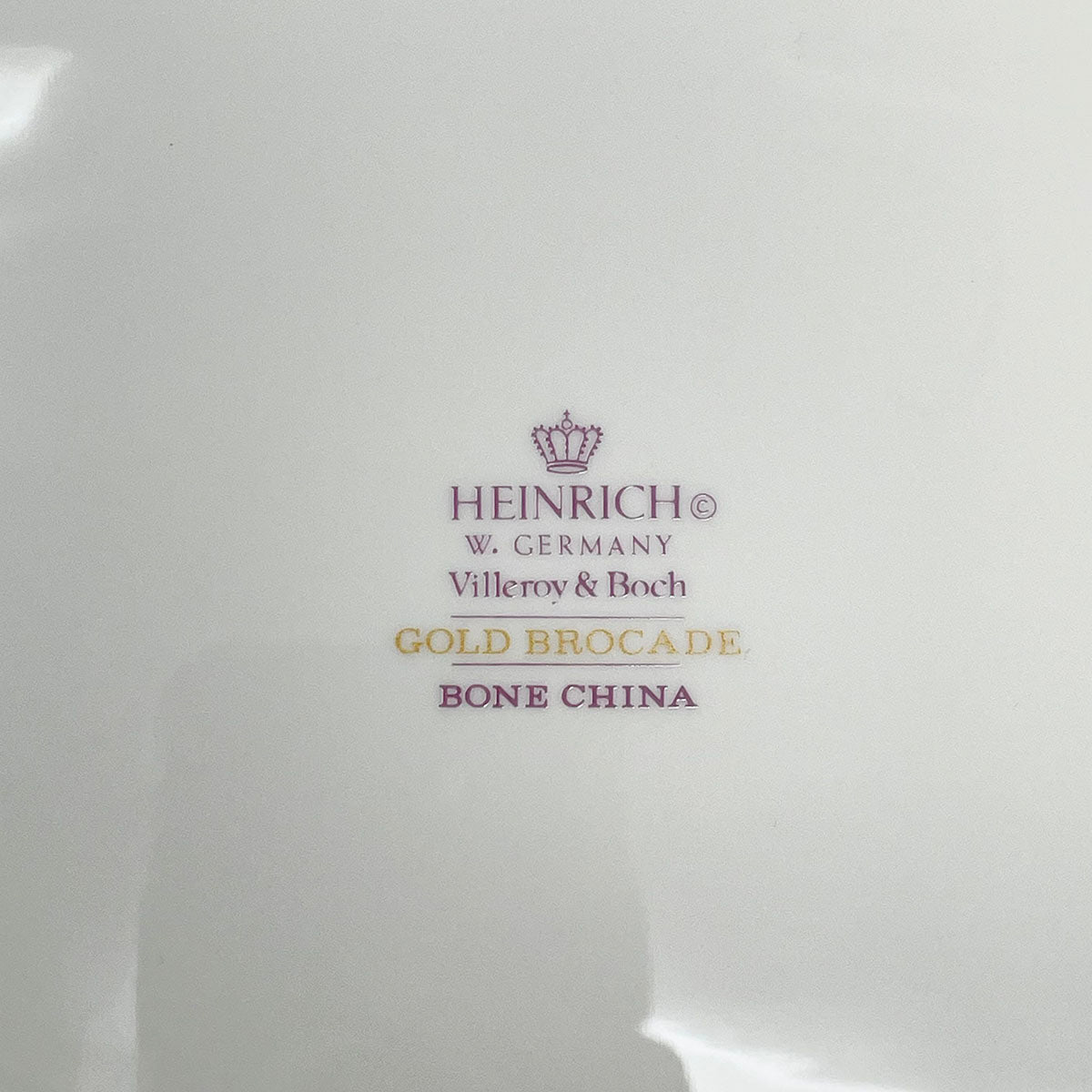 9 Serving Pieces of Gold Brocade China