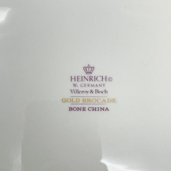 9 Serving Pieces of Gold Brocade China