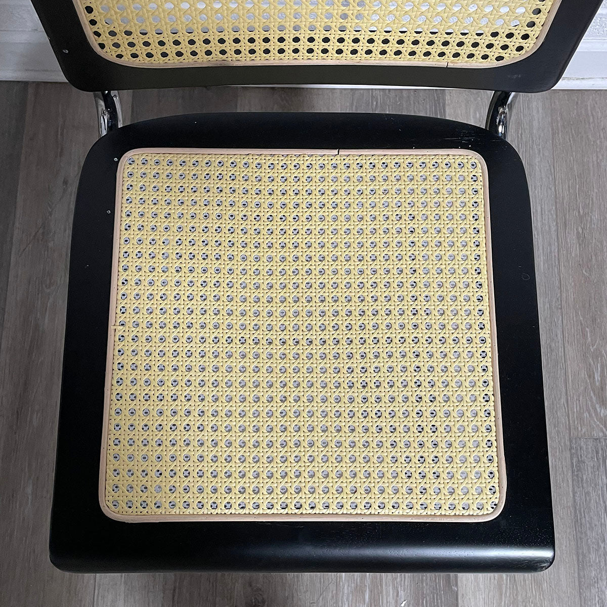 Pair of Black and Rattan Breuer Style Chairs