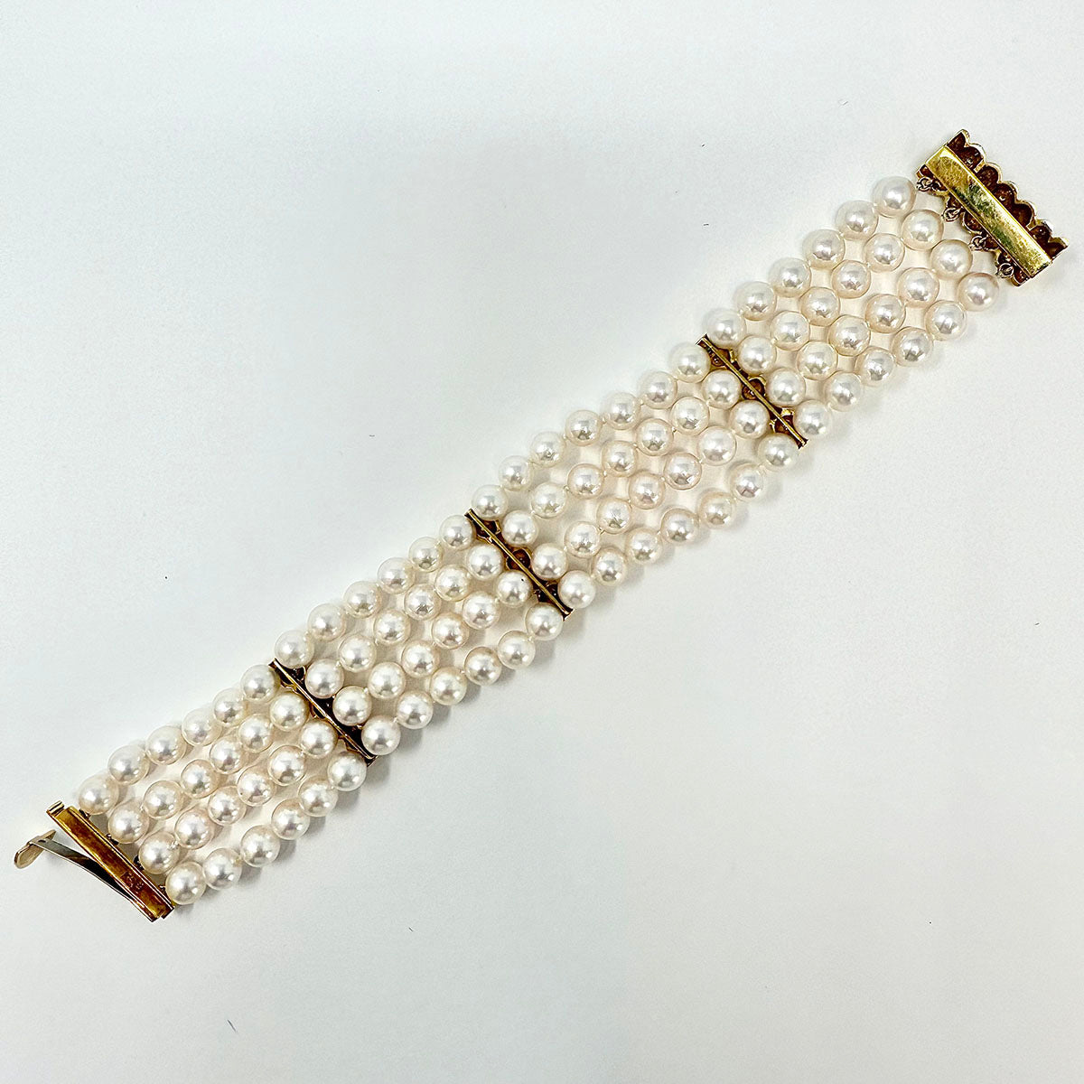 4 Strand Pearl Bracelet with Diamonds and 3 Diamond Bar Divider Bars