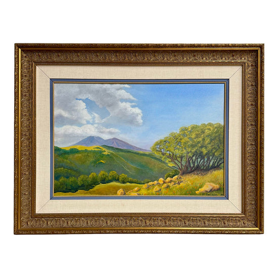 "Landscape Featuring a Meadow with Mountains in the Background" Signed