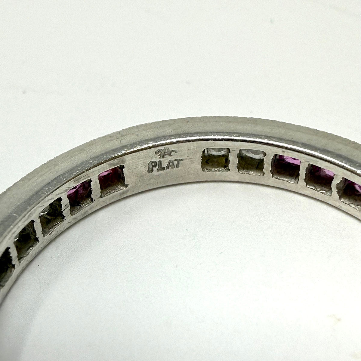 Platinum Ring with with Channel Set Pink Sapphire and Diamond