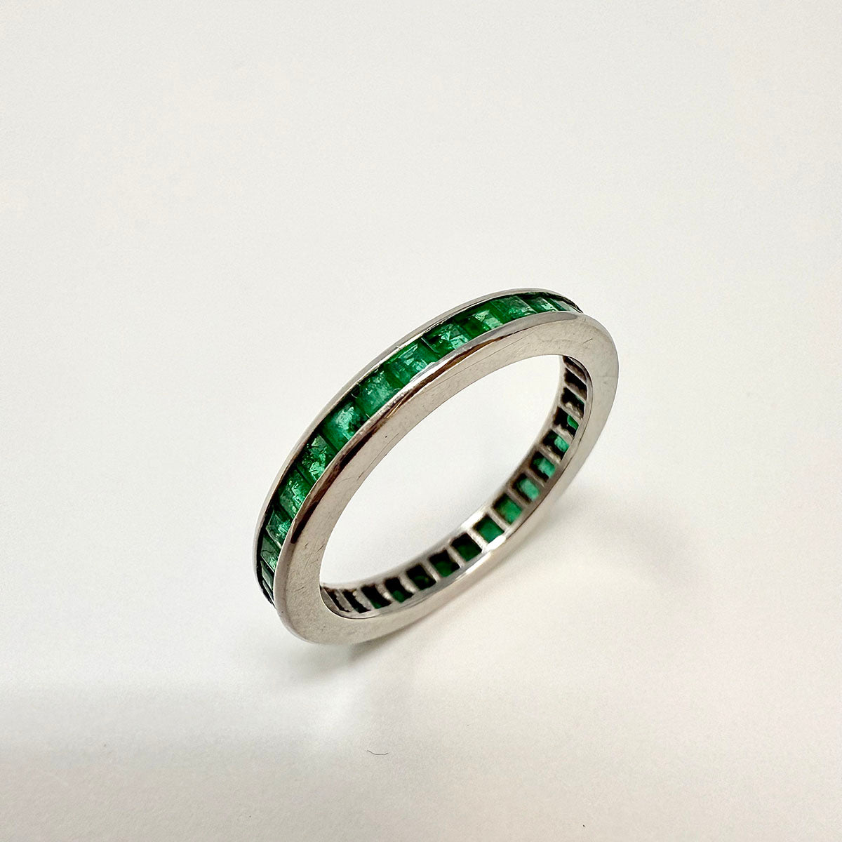 Platinum Channel Ring with Emeralds