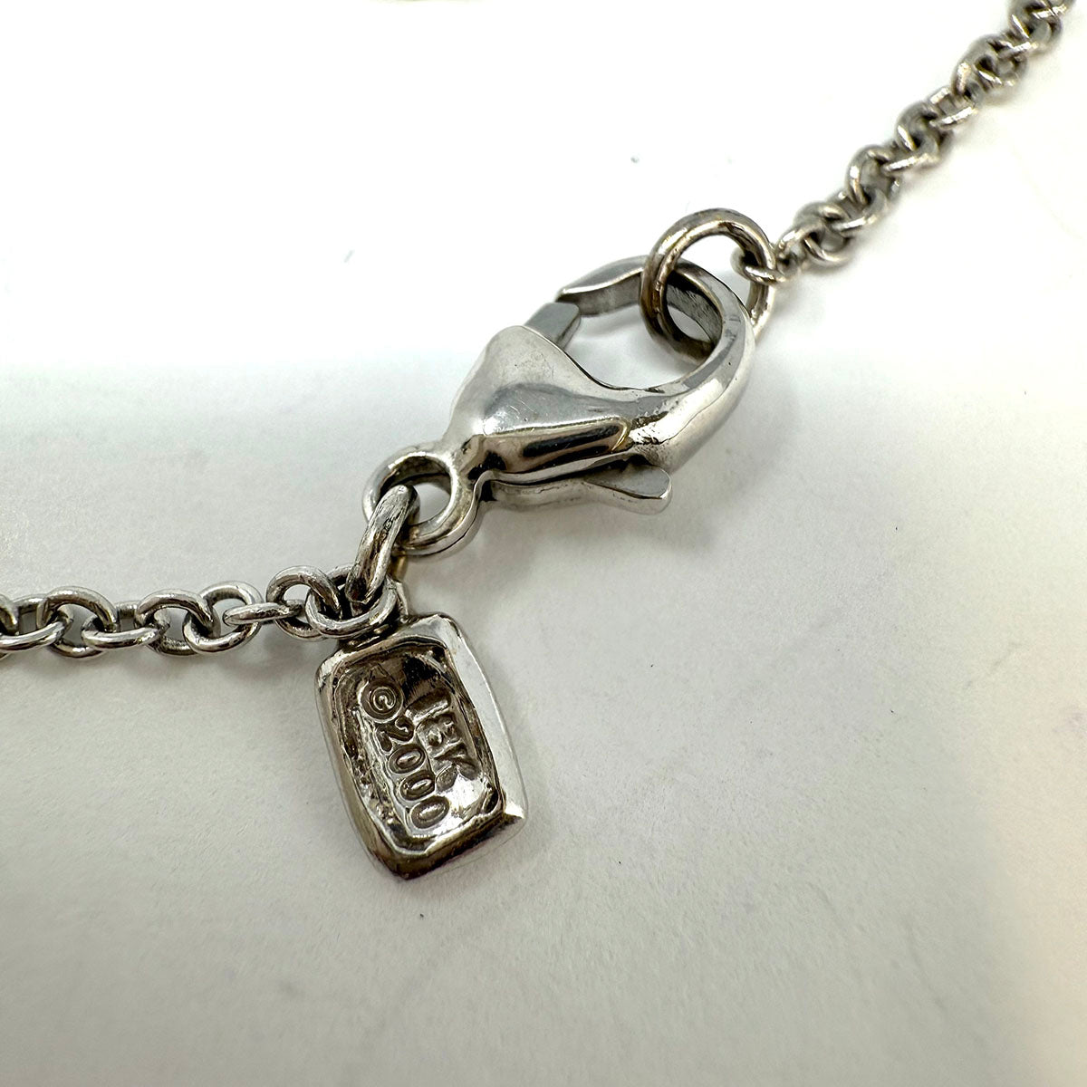 Doris Panos 18K White Gold Necklace with 1 Ruby and 19 Round Diamonds
