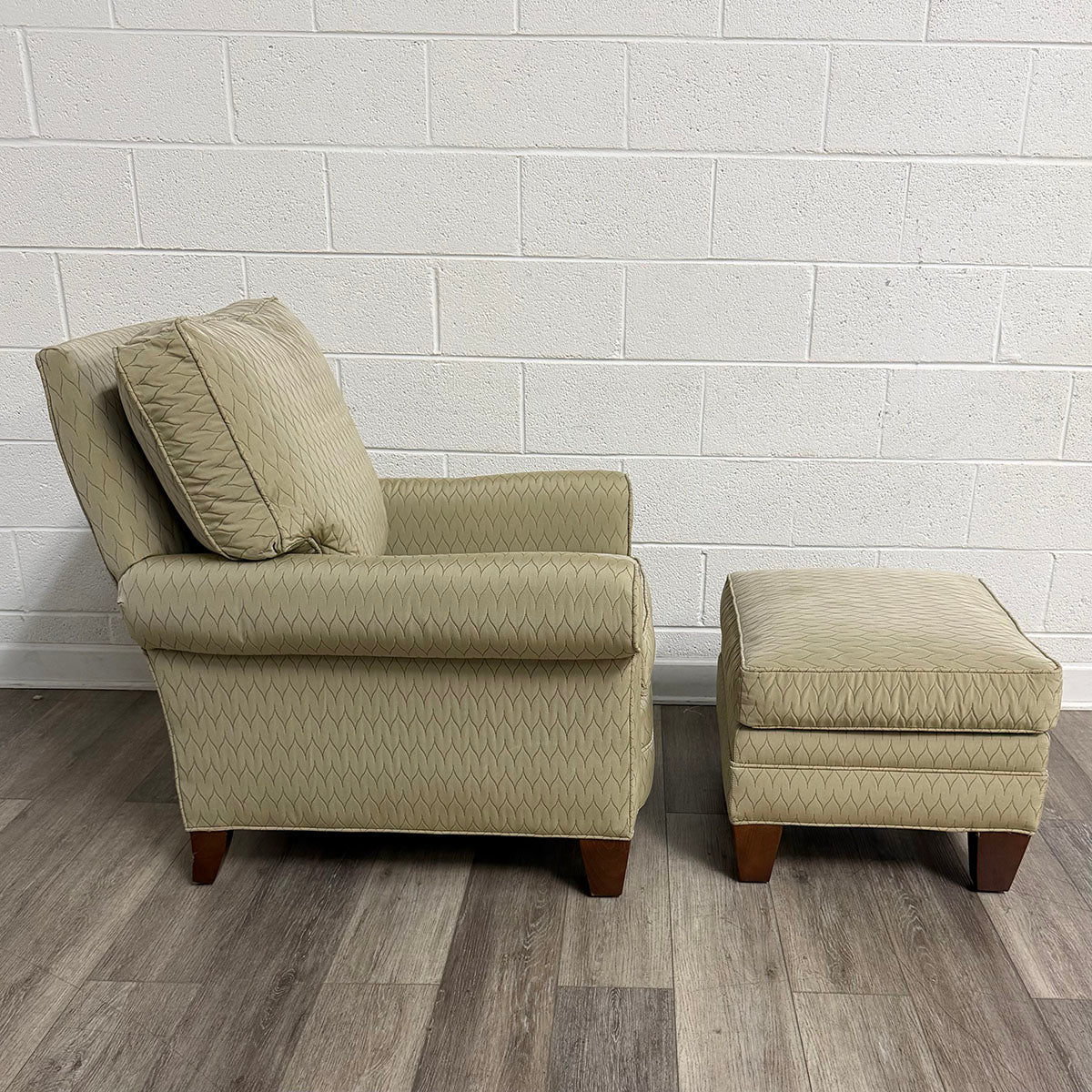 Beige Upholstered Armchair with Matching Ottoman