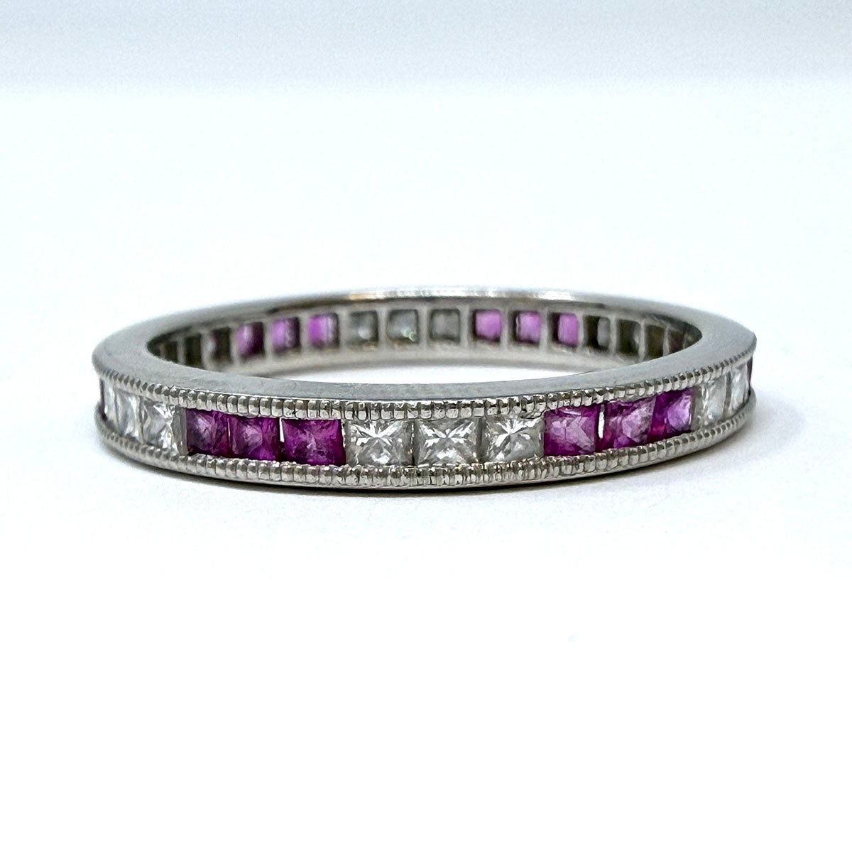 Platinum Ring with with Channel Set Pink Sapphire and Diamond