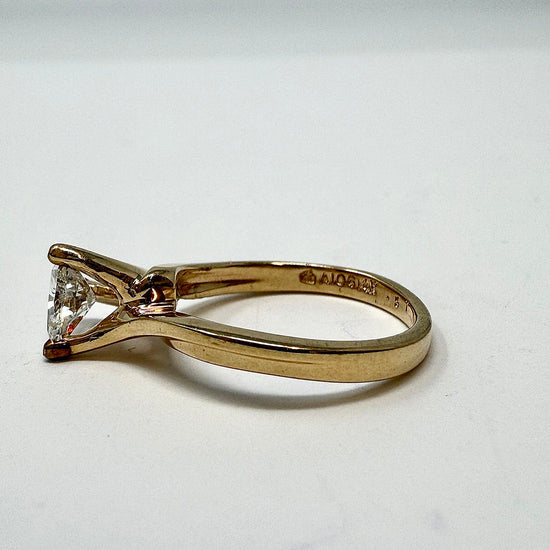 14K Gold Ring with Triangular Shaped Diamond