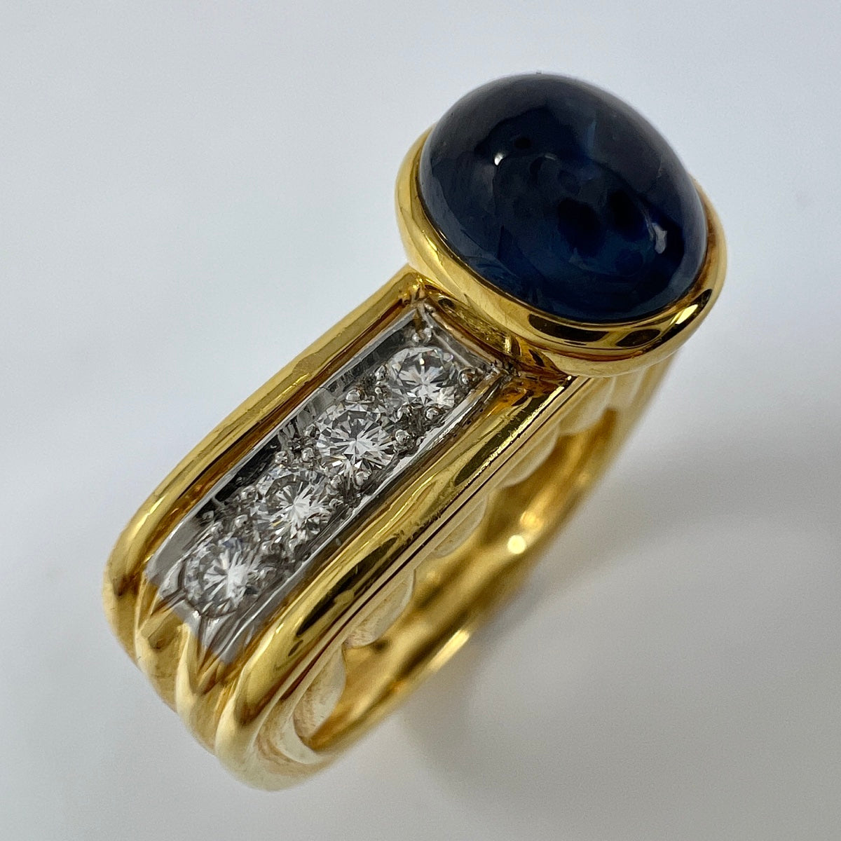 18K Ring with Oval Cabochon Sapphire and Diamonds