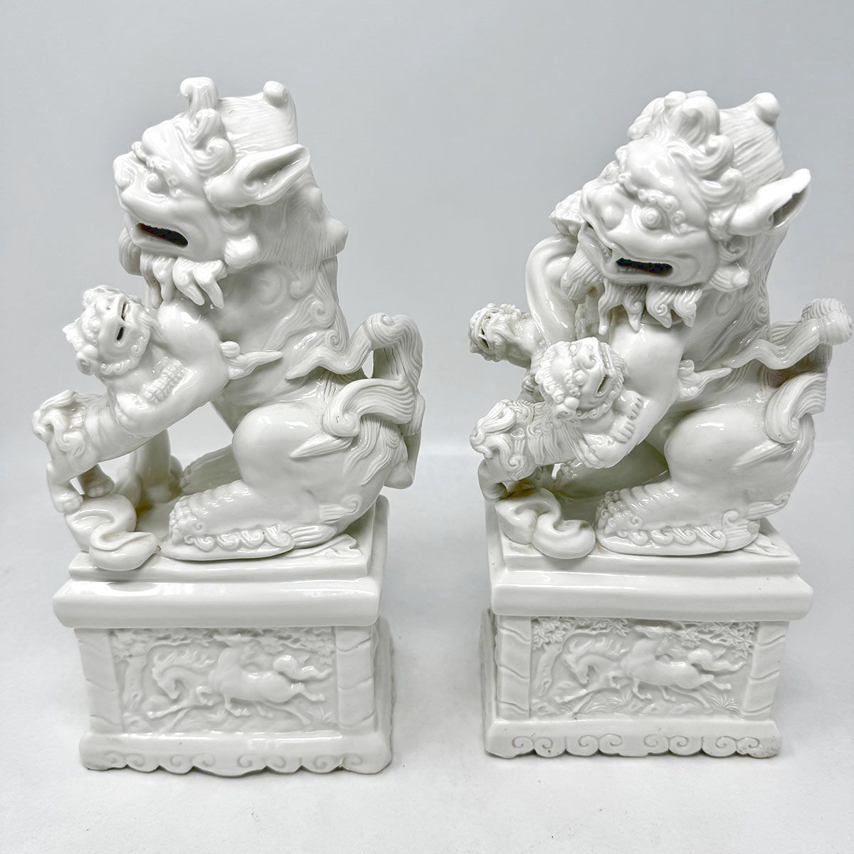 Pair of  Blanc de Chine Foo Dogs/Lions