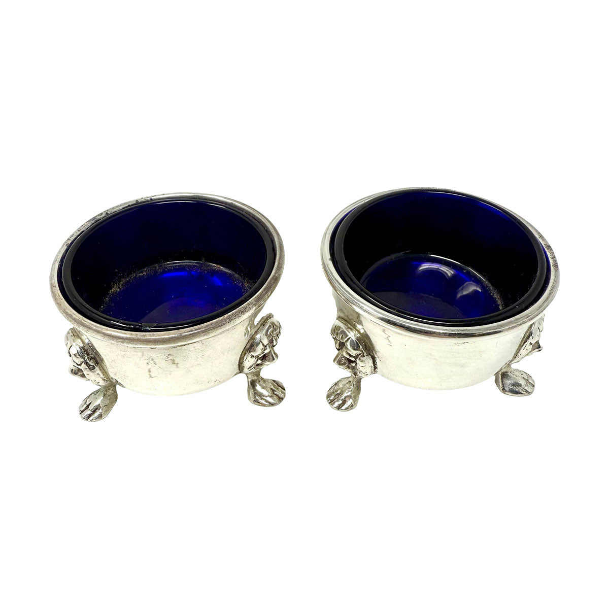 Pair of Glass Lined Repousse Sterling Salt Cellers