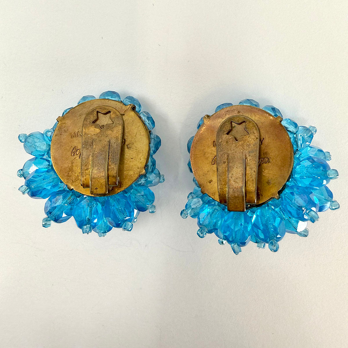 Signed Coppola e Toppo Iridescent Blue Bead Clip-on Earrings