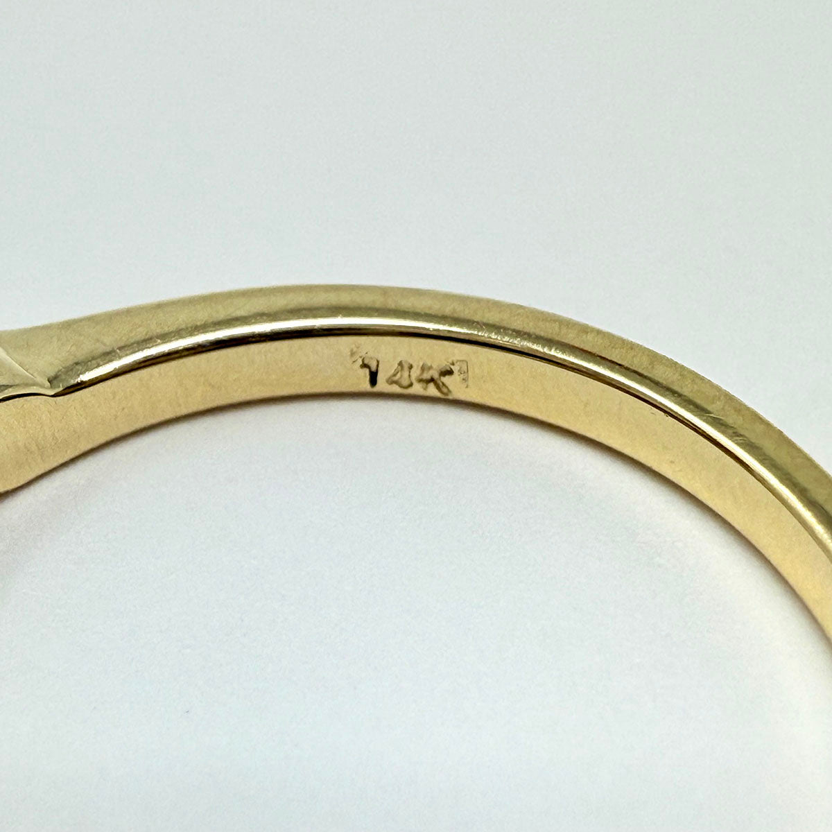 14K Gold Curved Ring with 8 Diamonds