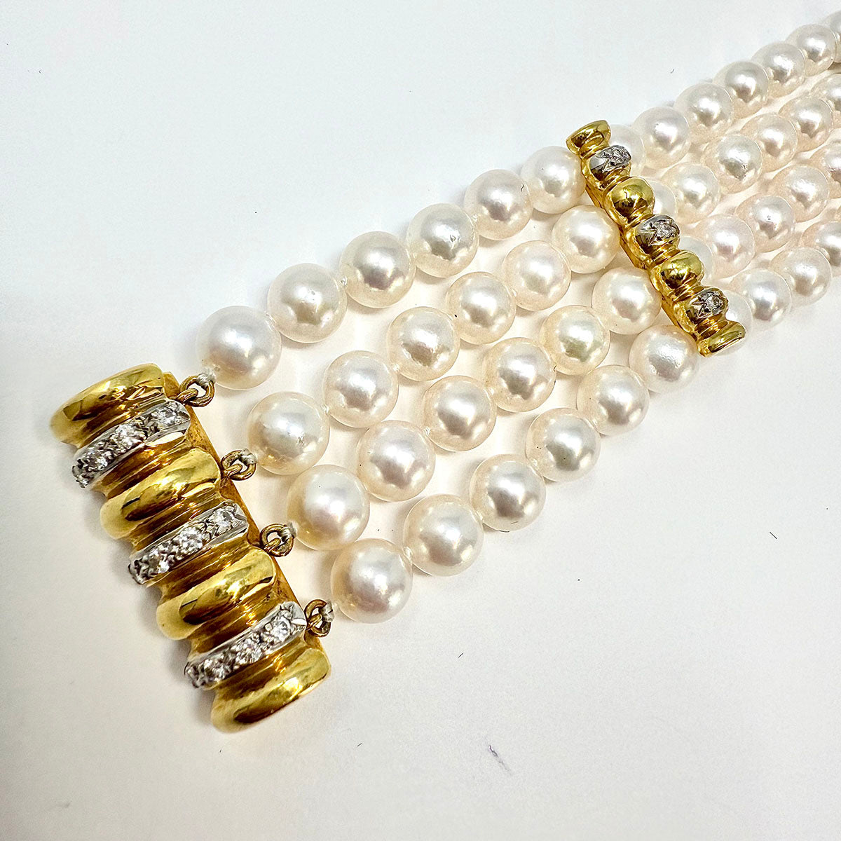 4 Strand Pearl Bracelet with Diamonds and 3 Diamond Bar Divider Bars