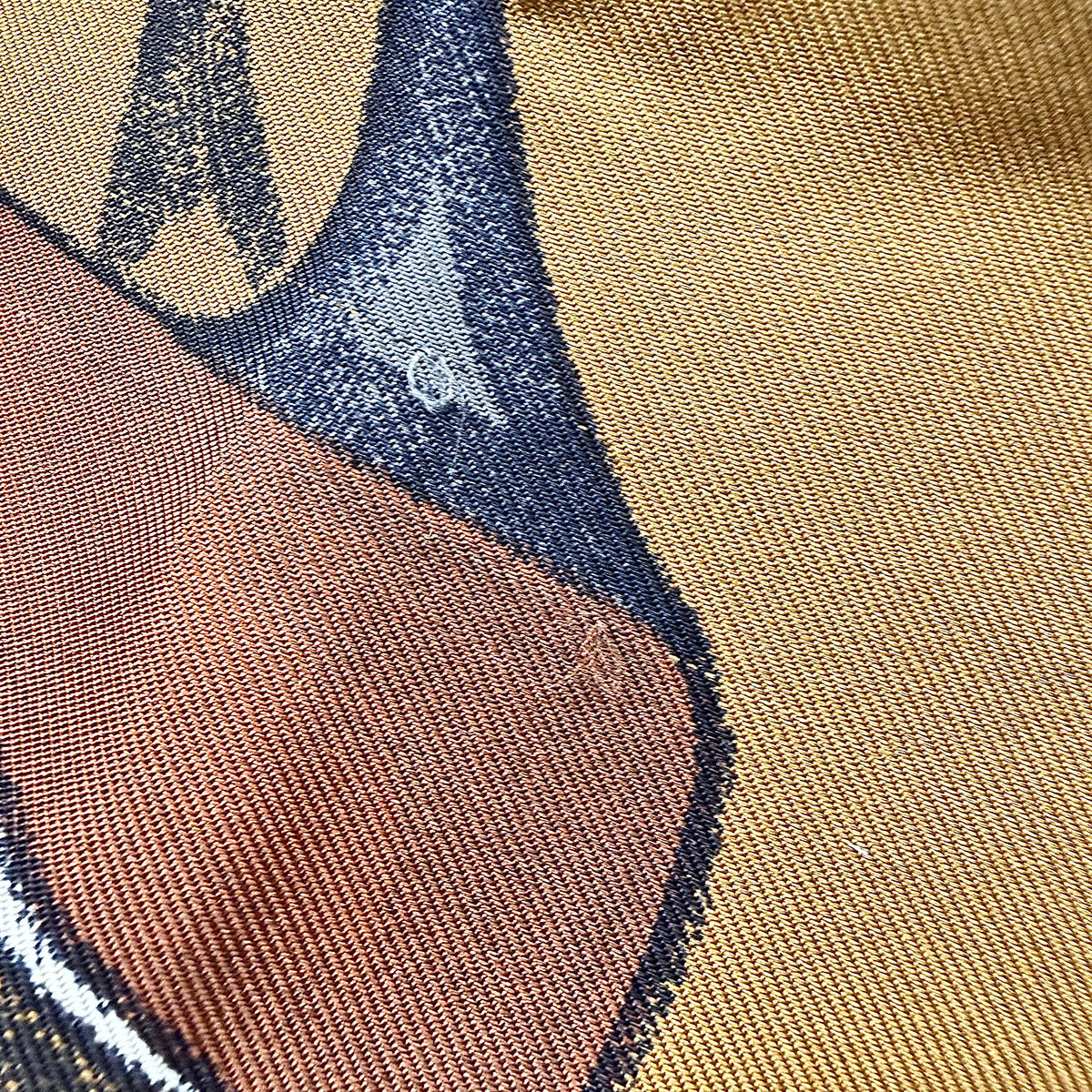 Fendi Scarf Featuring a Collage of Fendi Elements