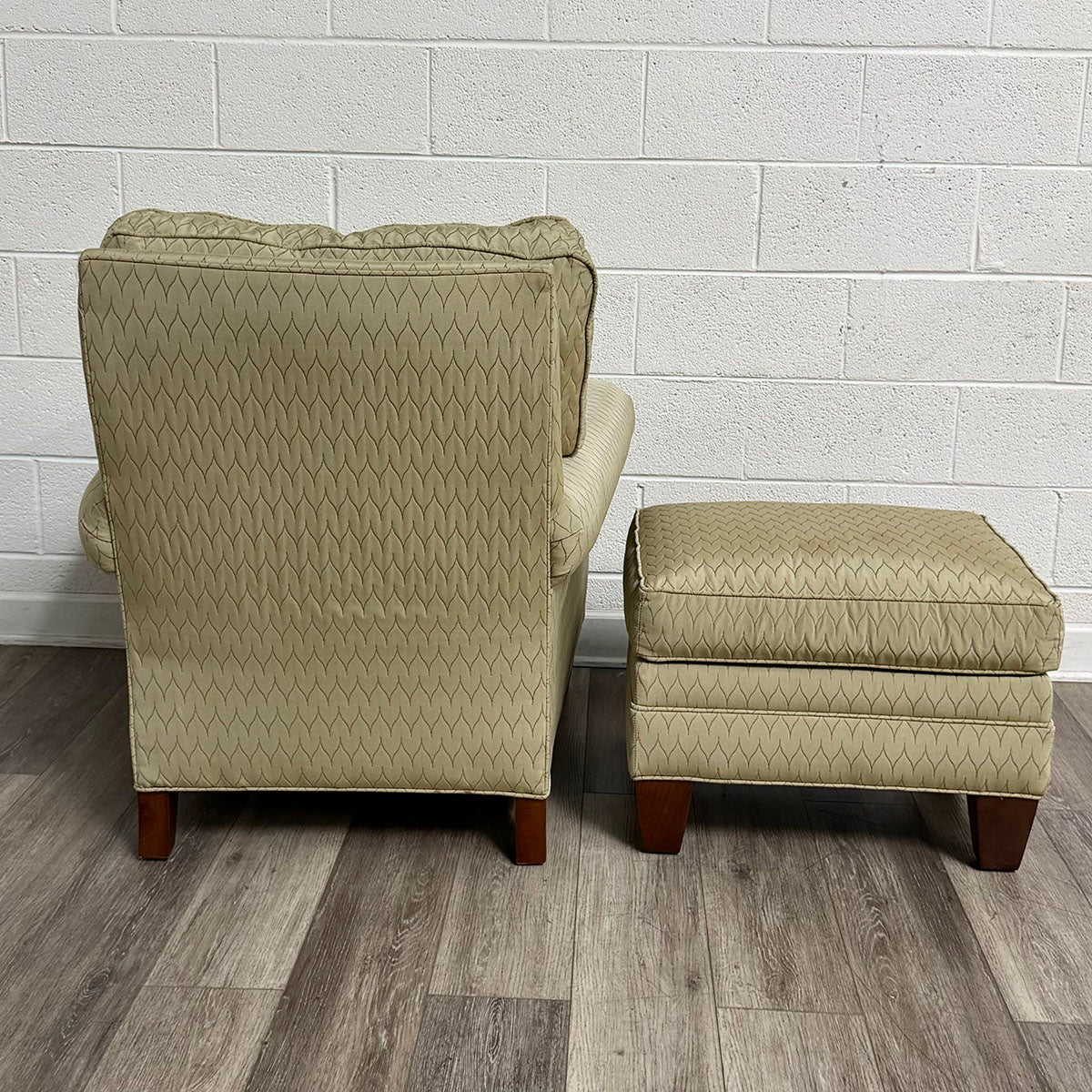 Beige Upholstered Armchair with Matching Ottoman