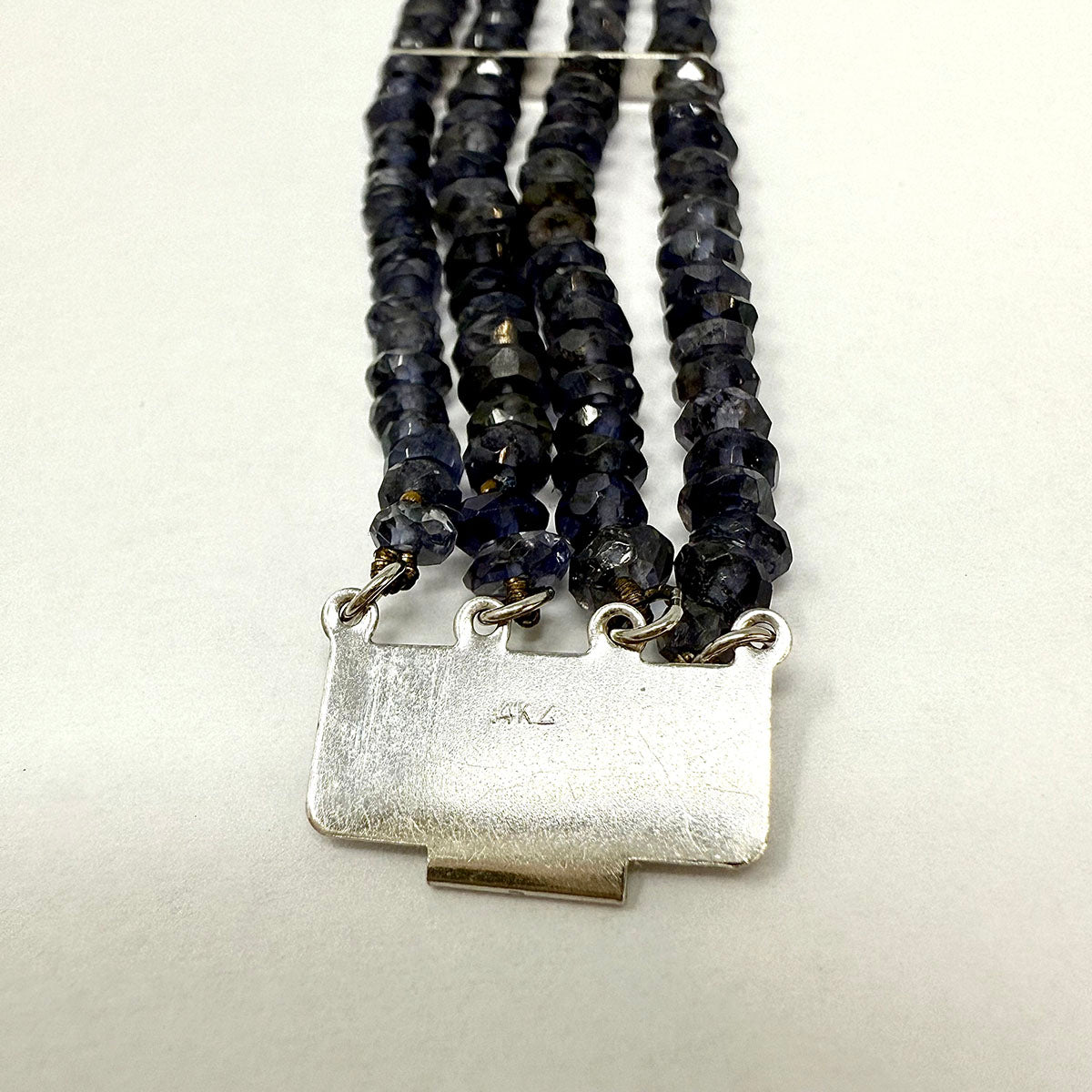4 Strand Iolite Bracelet with Sapphire at Center with Diamond Trim