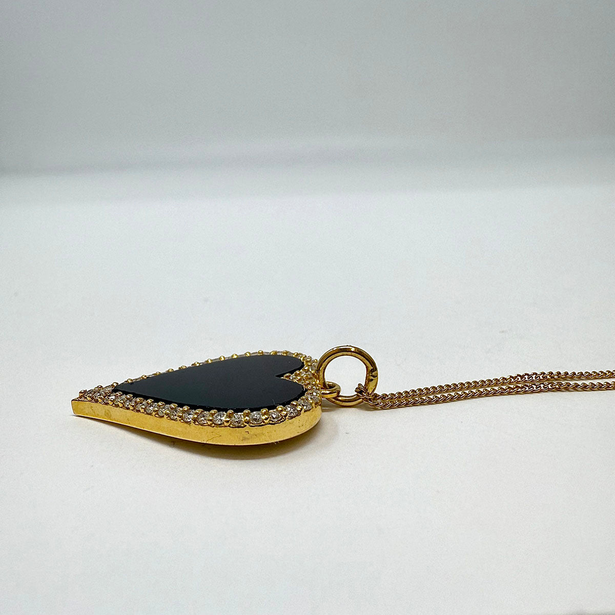 14K Gold Necklace with Black Onyx Heart Pendant with Diamond Trim