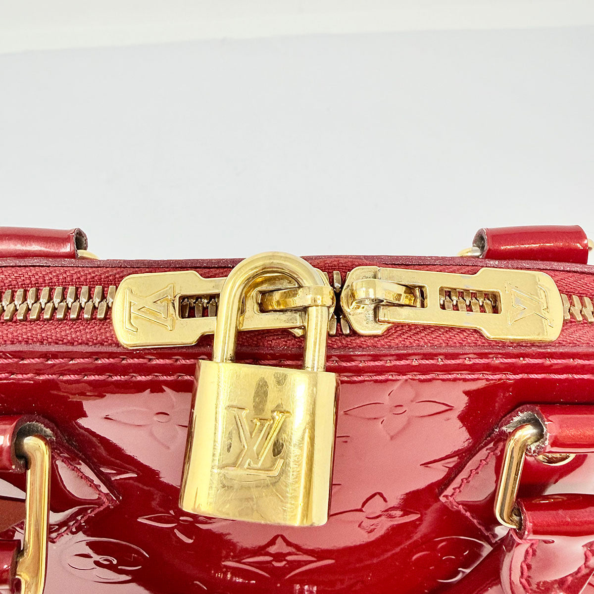 Louis Vuitton Monogram Alma Vernis Handle Bag