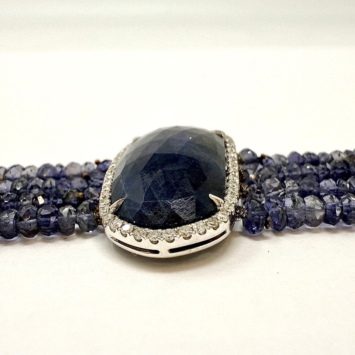 4 Strand Iolite Bracelet with Sapphire at Center with Diamond Trim