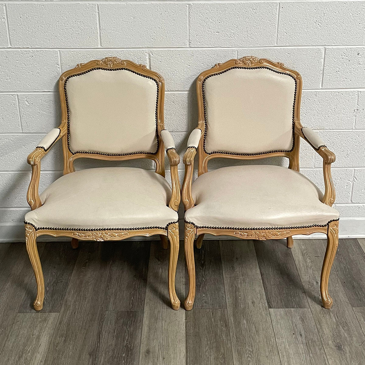 Pair of French-Style Leather Chairs With Nail Head Accents