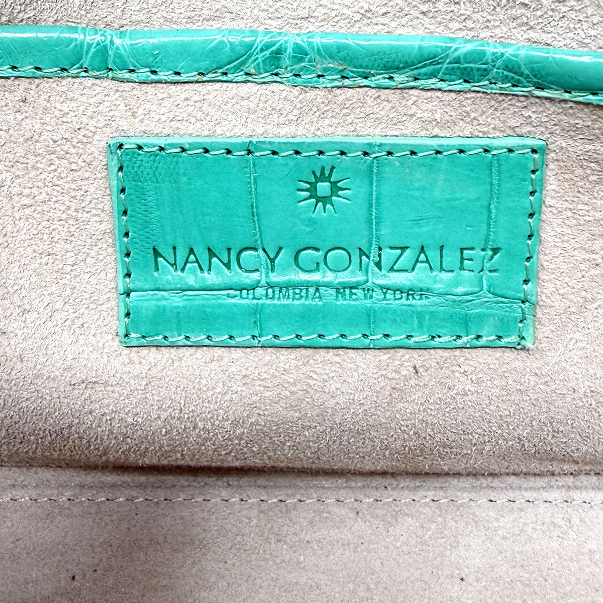 Nancy Gonzalez Clutch