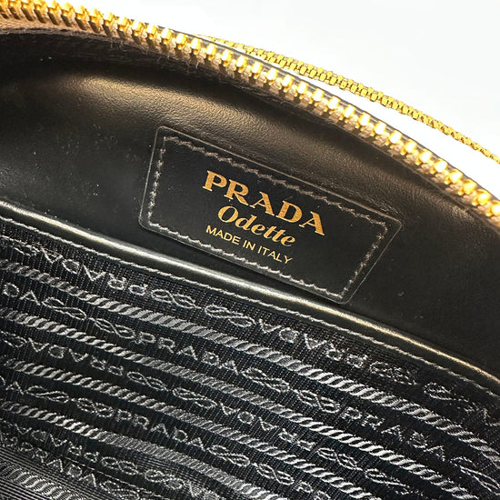 Prada Enameled Metal Triangle Odette Crossbody