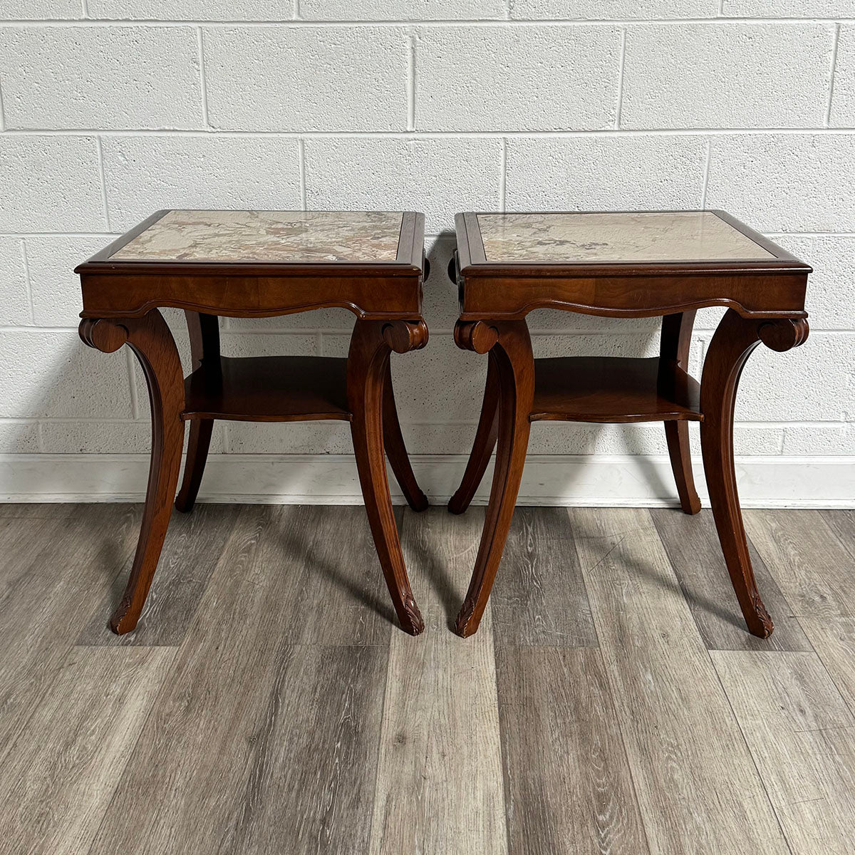 Pair of inlaid marble side tables