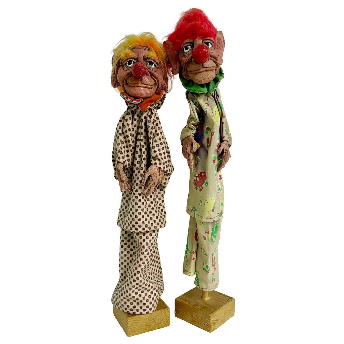 A Pair of Folk Art Clown Puppets on stand